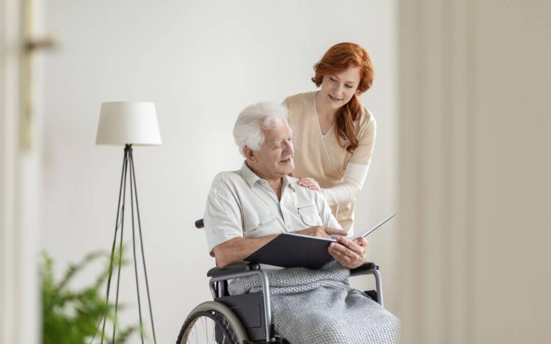 A nurse caring for an old man in a memory care faciliity
