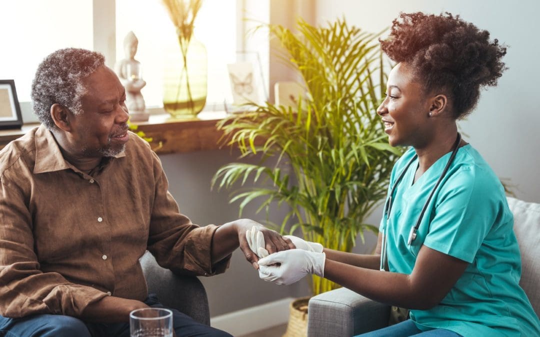 A dementia patient being welcomed by a nurse at an assisted living facility