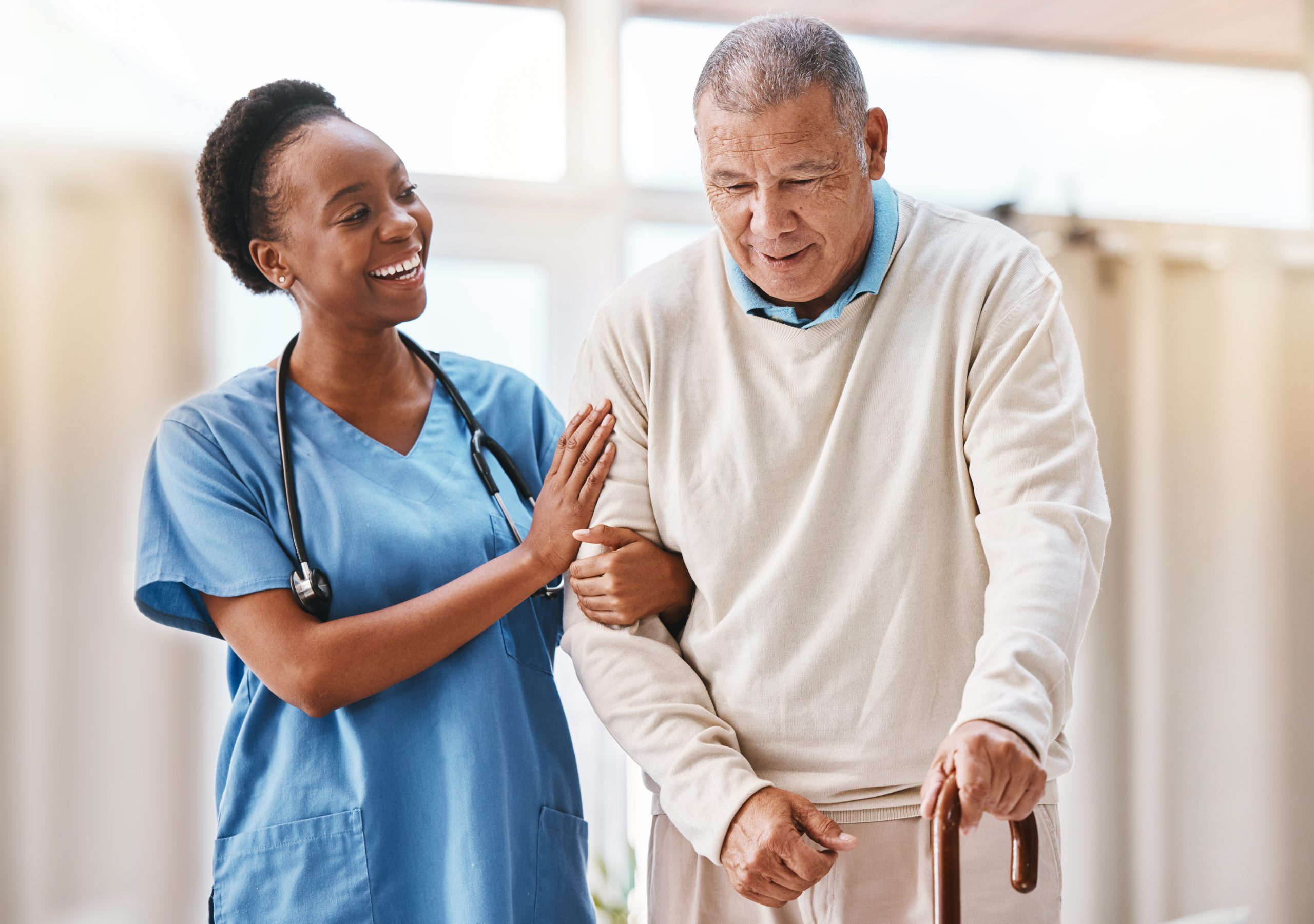 A nurse helping a patient in a skilled nursing facility
