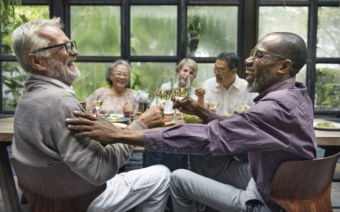 Seniors socializing over dinner