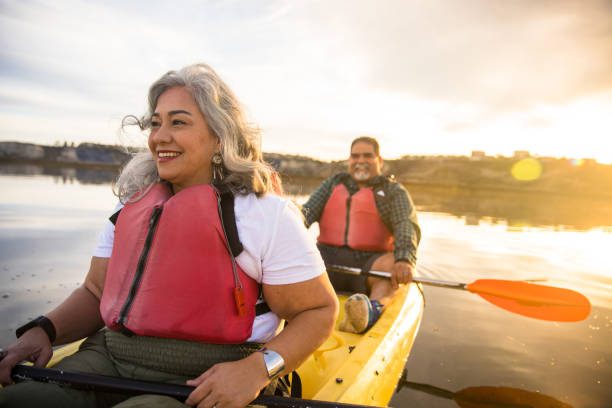 senior Hispanic couple kayaking